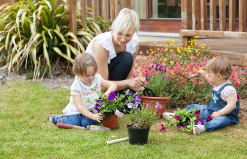 Beautiful landscaped garden in White City with plants and lawn